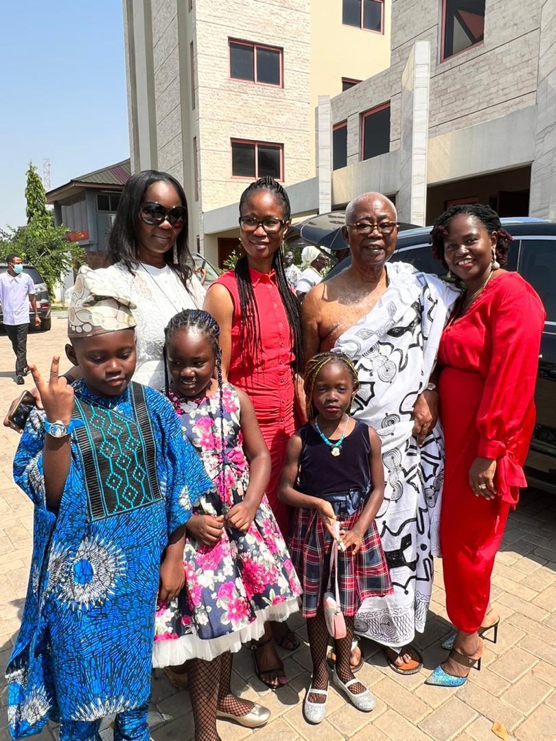 With daughters and grandchildren